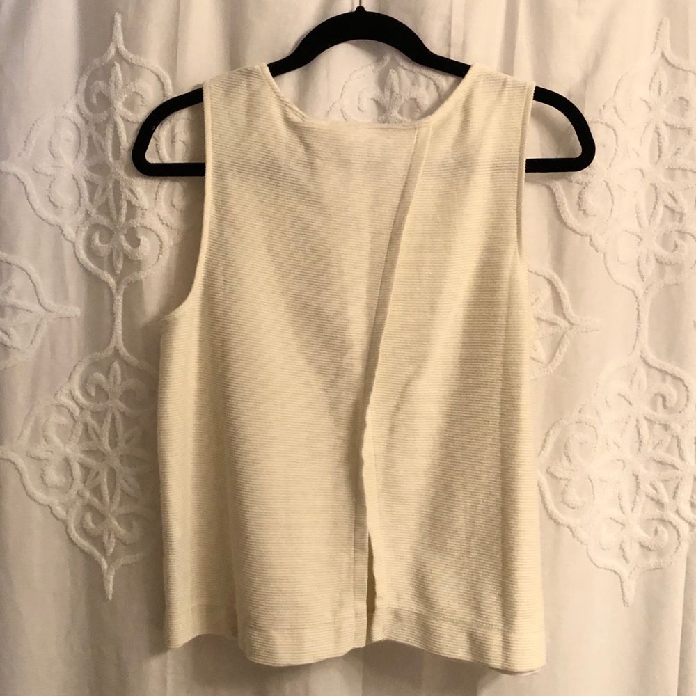 Winged back tank